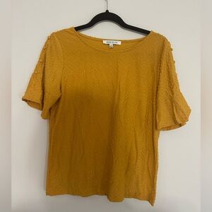 Burned orange blouse with knotted accents size med